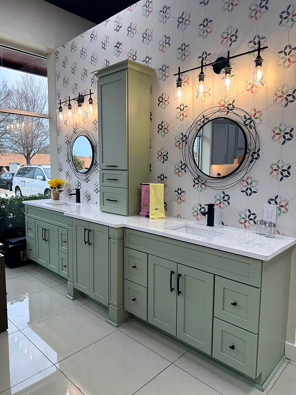 Sage green shaker double vanity with matte black pulls and tall linen tower, white — bathroom vanity by MNK Cabinet in Norcross, GA