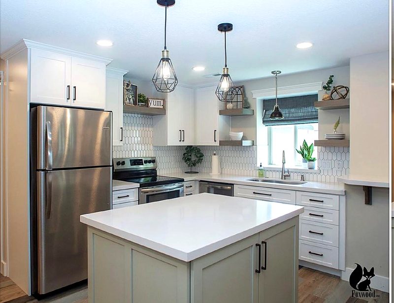 Compact U-shaped kitchen with white shaker perimeter cabinets, light sage-green shaker — kitchen by MNK Cabinet in metro Atlanta